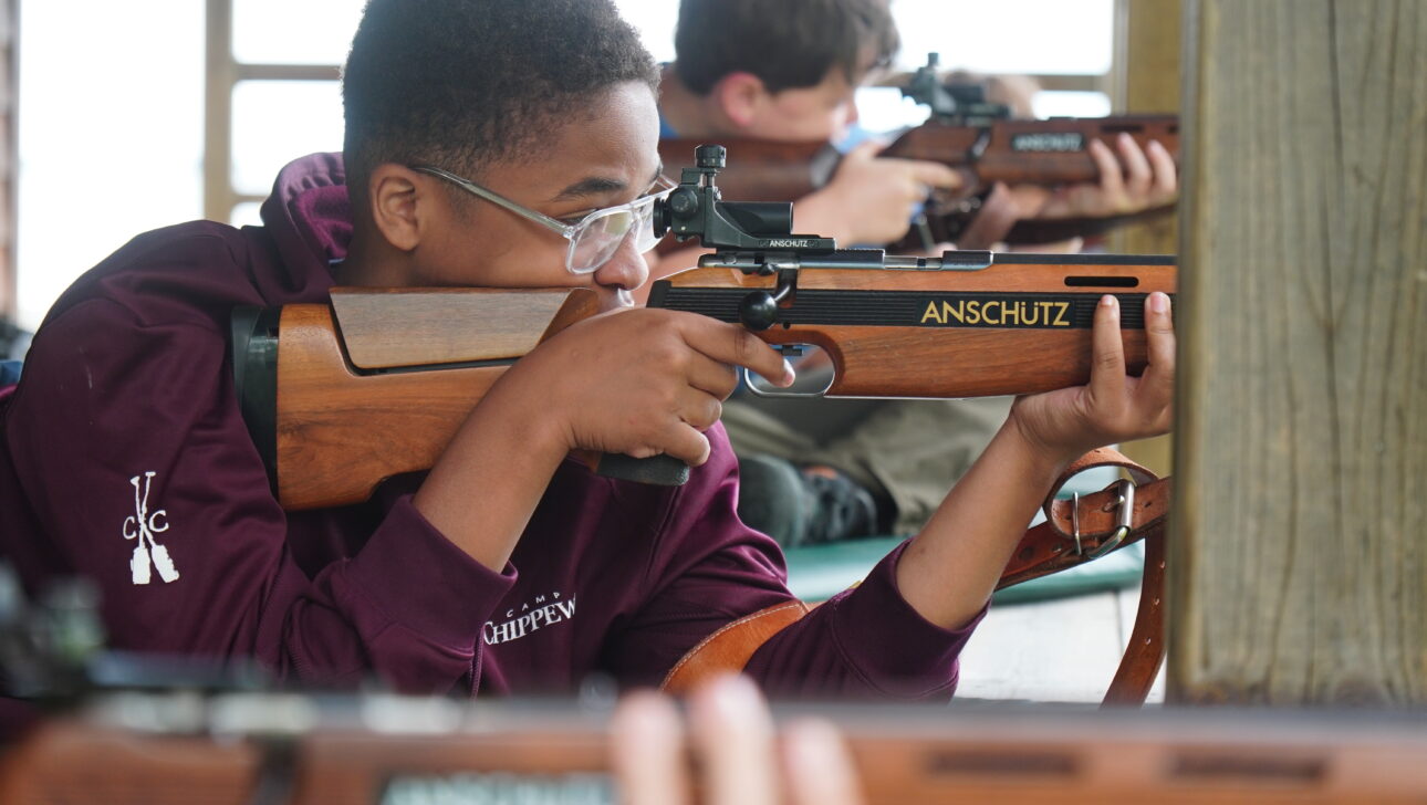 camper aiming at the Rifle Range