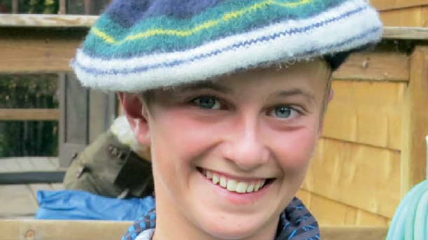 boy in a felt hat.