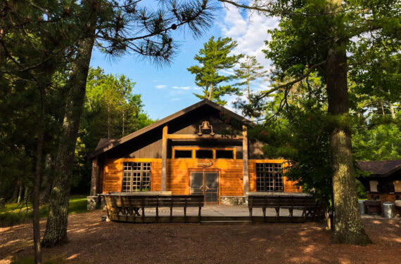 large cabin in the woods.