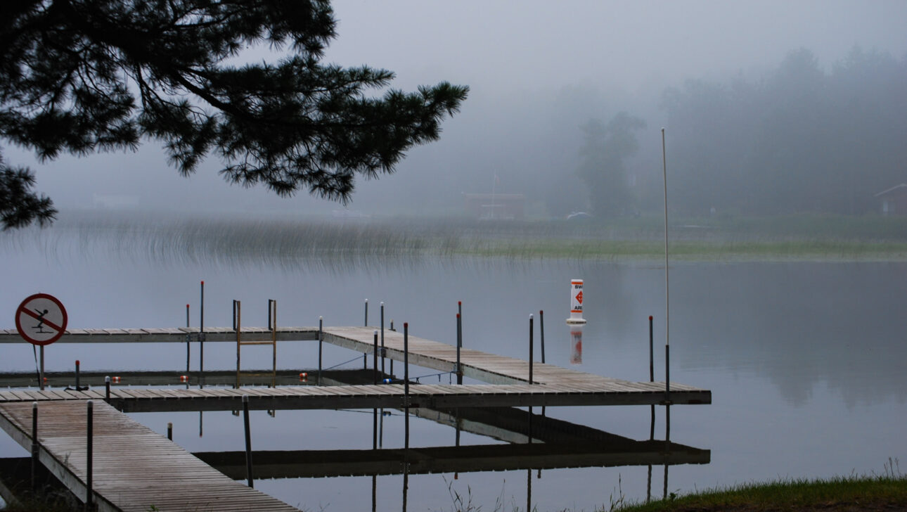 dock in misty weather.
