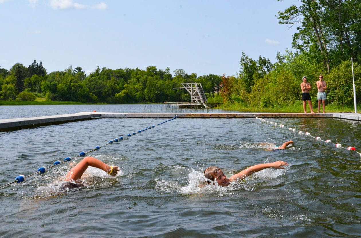 swimmers in swimming lane.