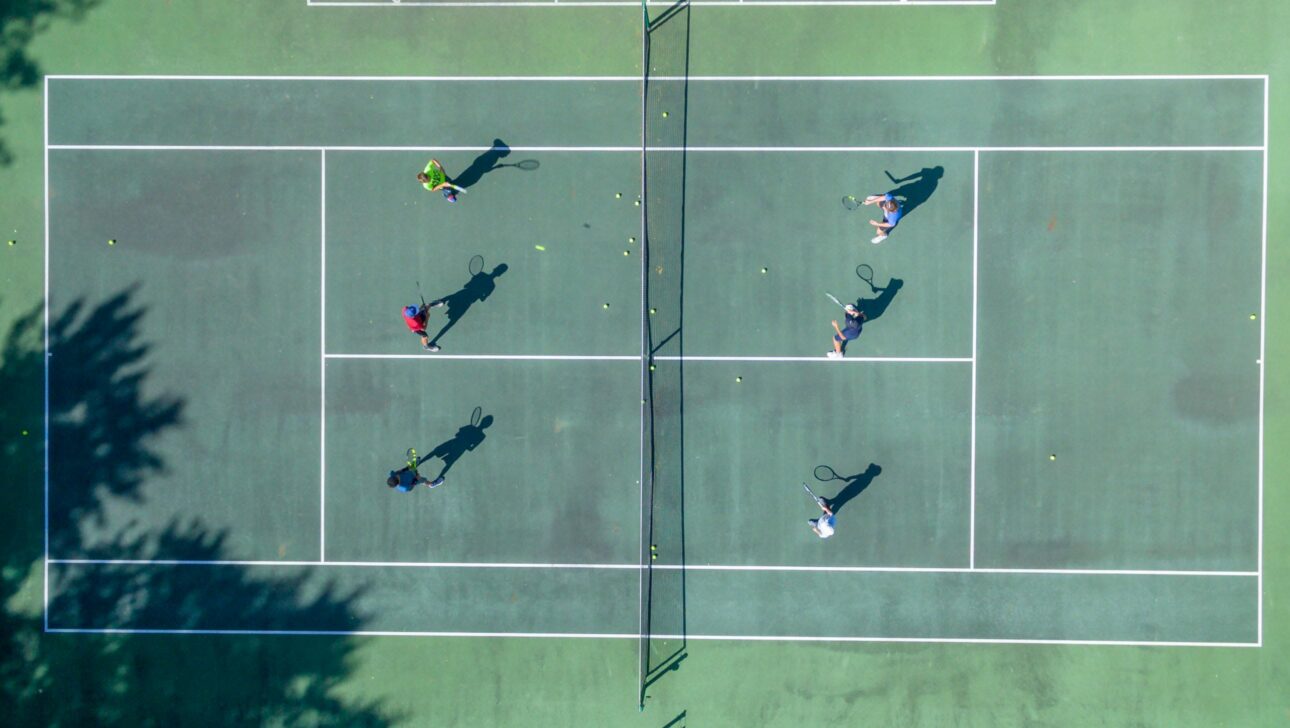 overhead aerial shot of tennis court.