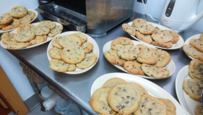 plates of chocolate chip cookies.