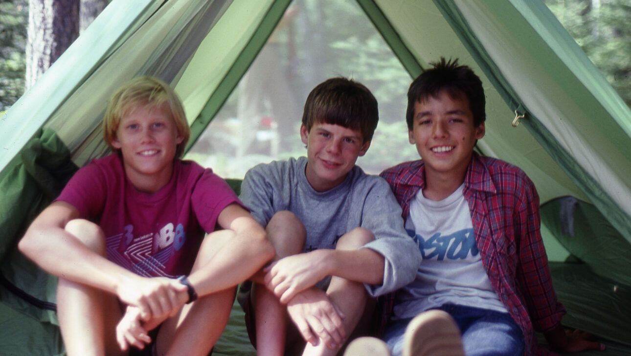 Boys in a tent in the 1980s.