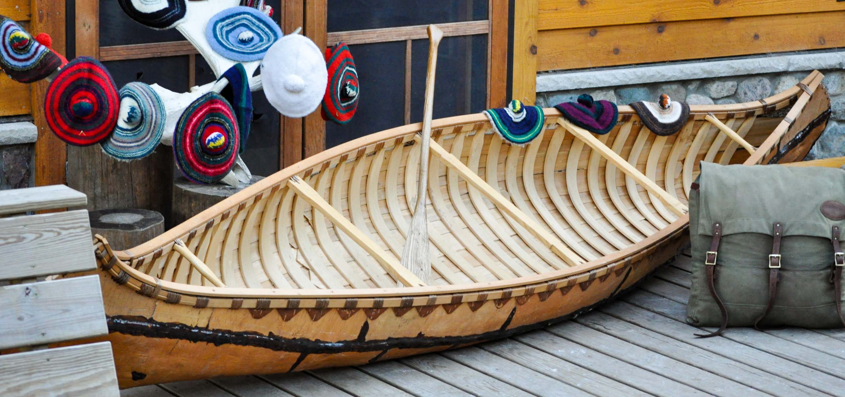 wooden canoe on a deck.