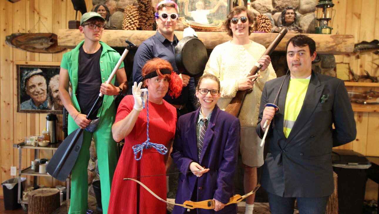 counselors dressed as characters from clue.