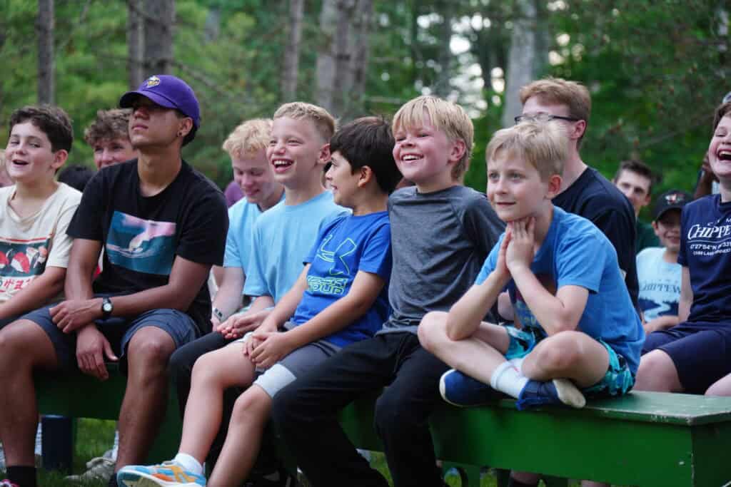 a group of campers laugh together